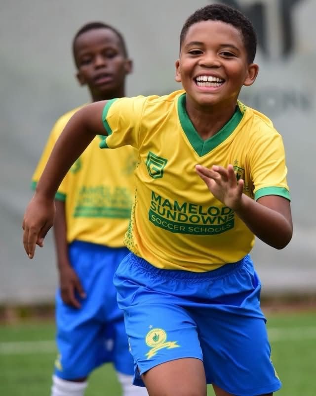 Young players enjoying football together