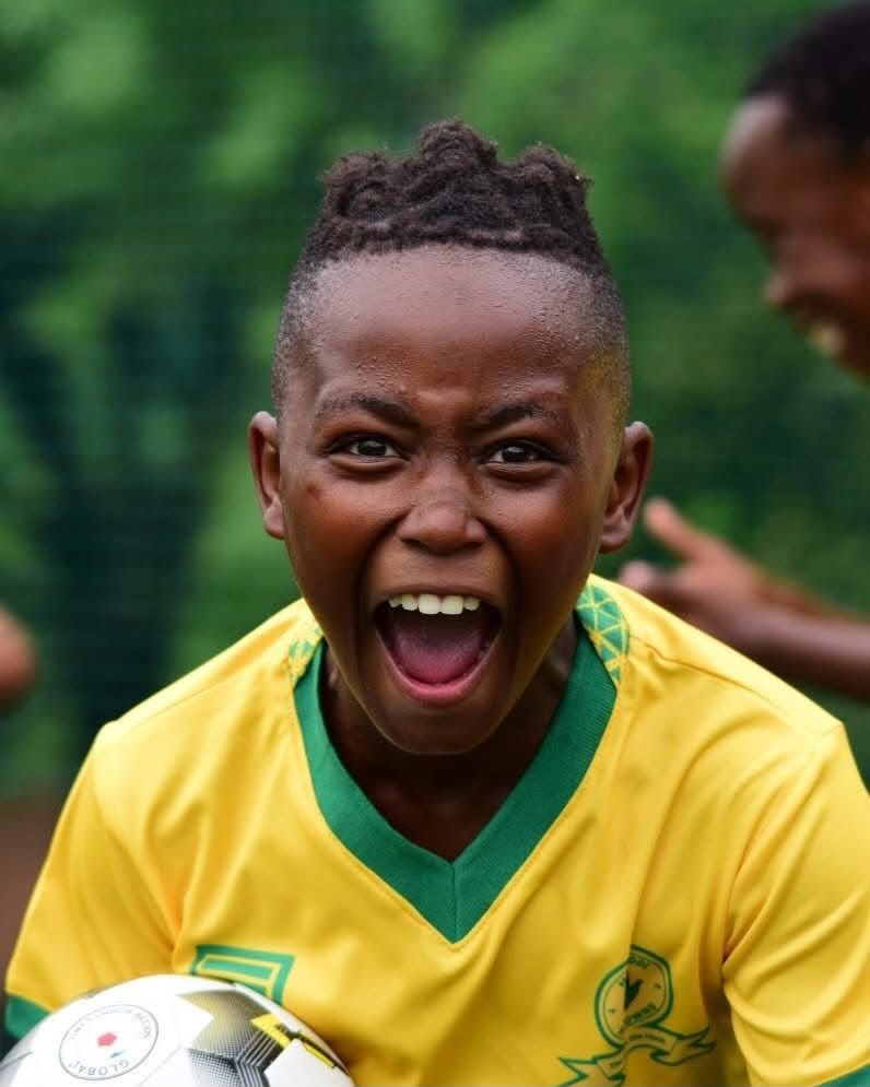 A young footballer celebrating